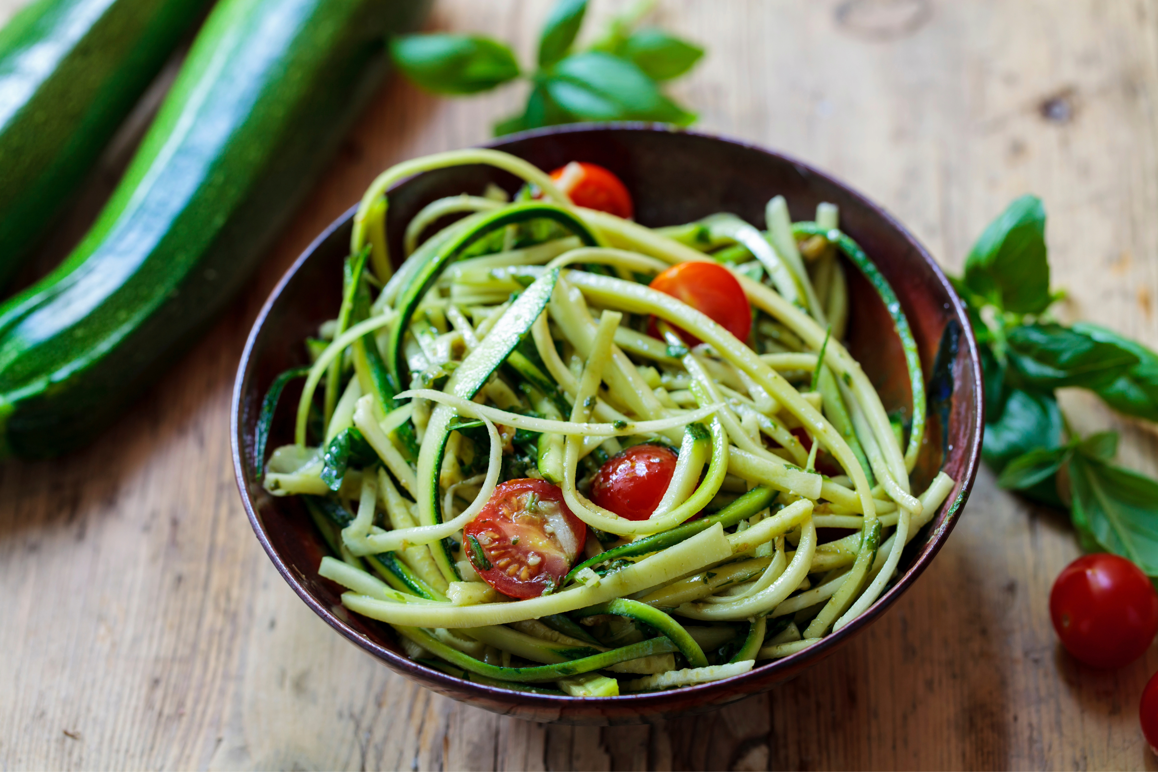 Close-up of zucchini noodles with pesto