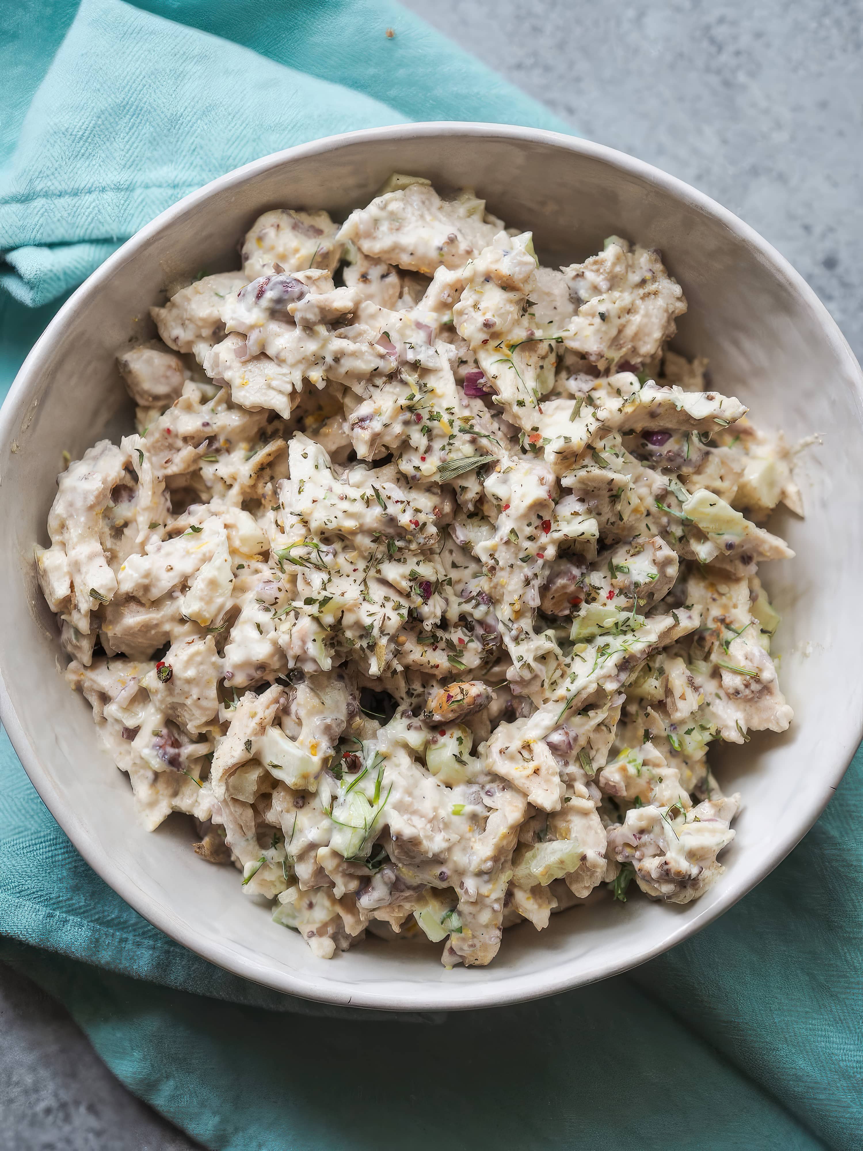 Close-up of simple chicken salad with fennel and yogurt dressing