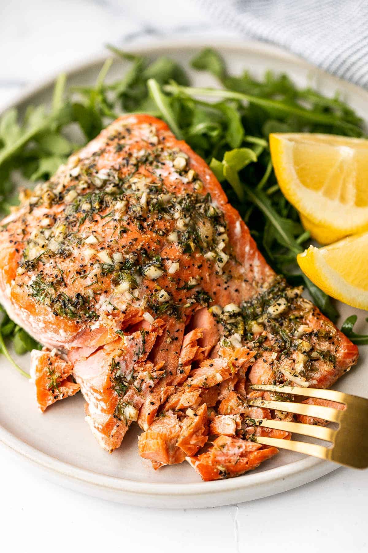 Close-up of greek salmon on a plate