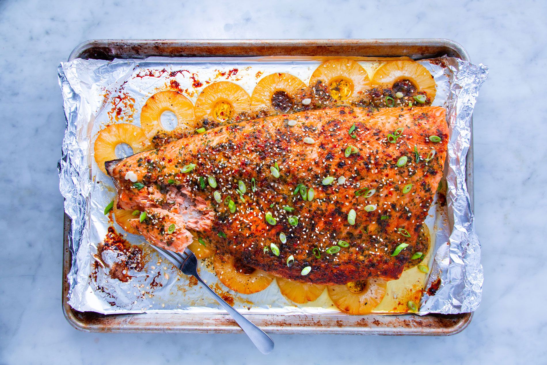 Close-up of baked pineapple salmon on a plate