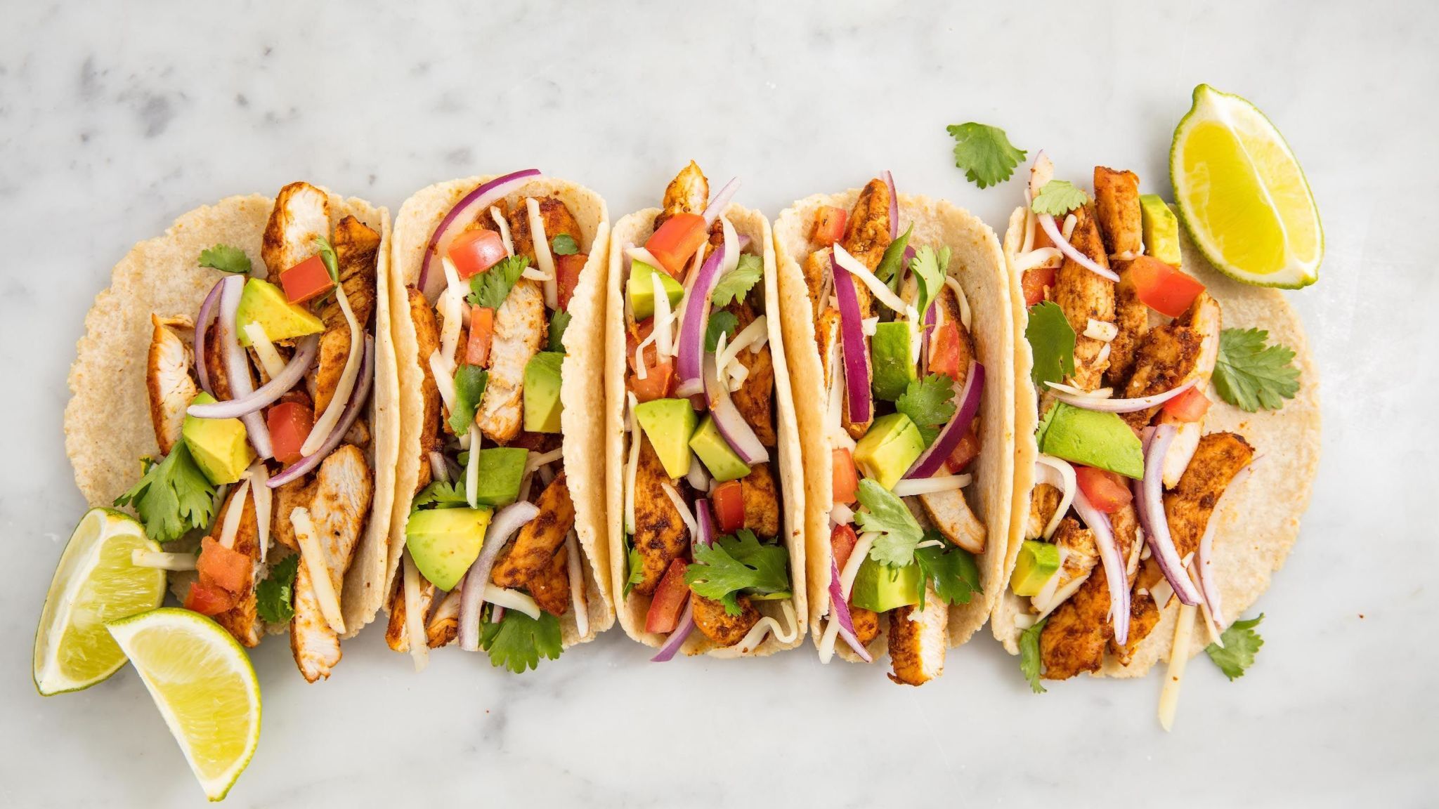 Close up of chicken tacos on a table